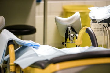 Gynecological surgery room with chair and equipment in Reproductive medicine Clinic. Selective focus, artificial insemination operating room