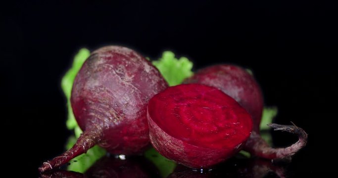 Rotating fresh ripe beets .