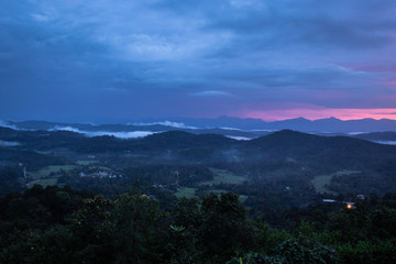 Obraz premium Misty mountains range with amazing sky