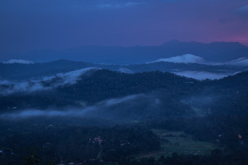 Misty mountains range with amazing sky