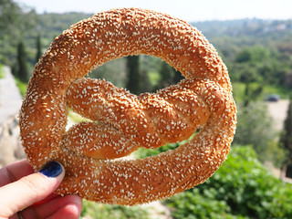 Freshly baked bagel pretzel with sesame seeds