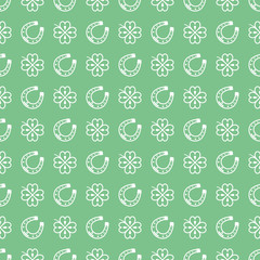 Seamless vector pattern with white clover leaves, shamrock and Horseshoe on a light green backdrop for St. Patrick's Day. Spring fest background for greetings card, decor, flyer, print, packaging etc.