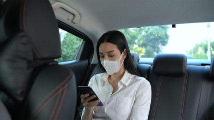 Travel Concept. The masked woman is traveling to the doctor at the hospital. 4k Resolution.