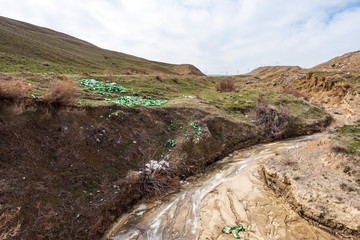 Environmental pollution by household garbage