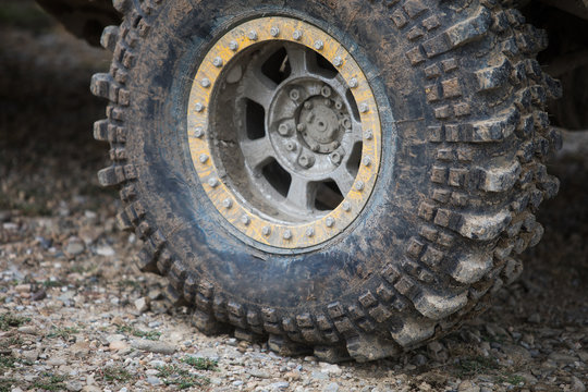 Muddy off road tire on a 4x4 car