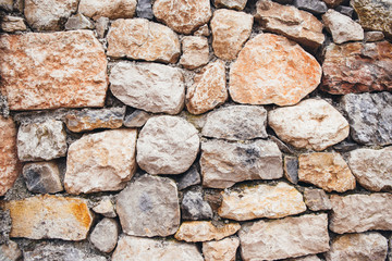 Wall of large natural stones.