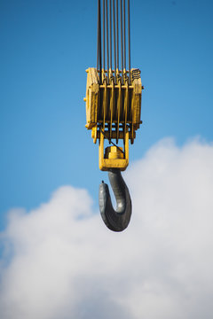A picture of a crane hook against the sky.   Vancouver BC Canada