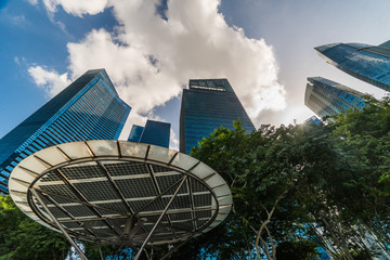 Looking up in Singapore at tall buildings, one of the most developed parts of Asia