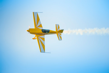 Acrobatic airplane in the sky