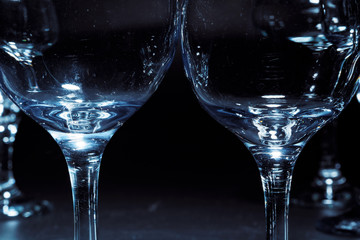 Empty  glasses for drinks on dark background