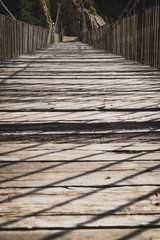 Wooden walkway seen from ground level.