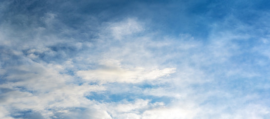 Backgrounds and textures. Blue beautiful sky with clouds.