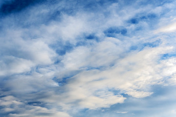 Backgrounds and textures. Blue beautiful sky with clouds.