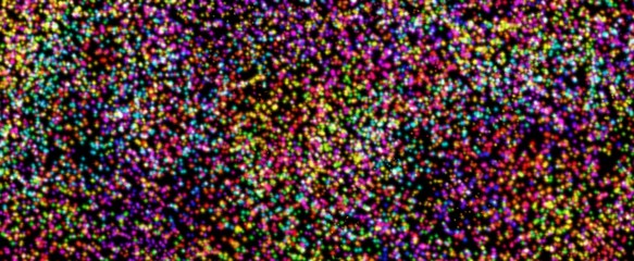 glittery bright shimmering background perfect as a rainbow backdrop.Element of design.iridescent sprocket, shiny confetti. Scattered little sparkling, glitter balls, circles.  New Year Christmas .