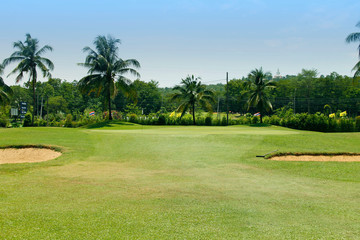 Fototapeta premium The evening golf course has sunlight shining down at golf course in Thailand