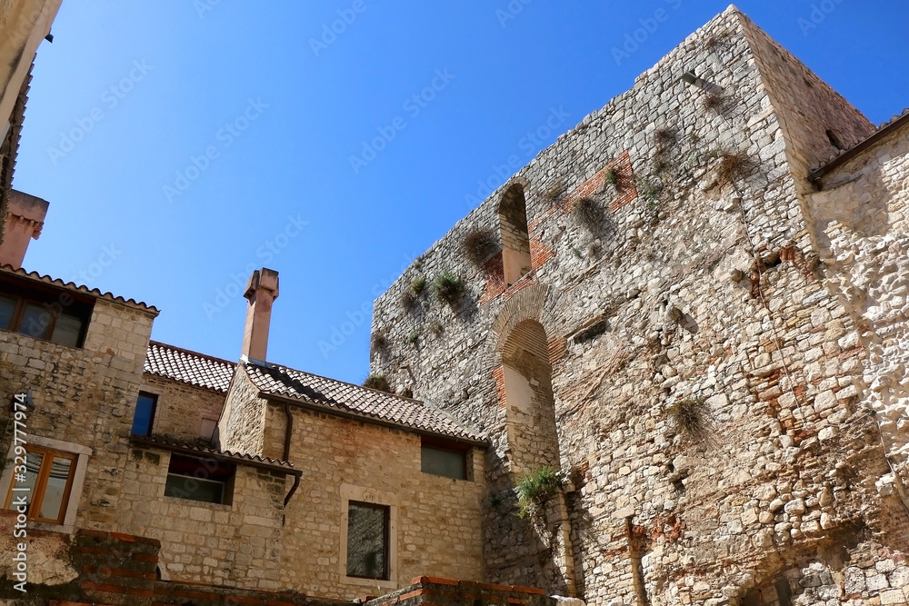 Wall mural Anicent wall and traditional Mediterranean architecture in Split, Croatia.