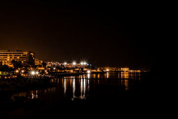Fototapeta na wymiar long exposure city scape with reflection in the sea
