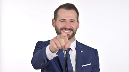 Portrait of Young Businessman Pointing Finger at the Camera, White Background