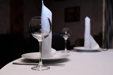 Laid table for guests. Table setting.