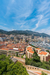 Naklejka na ściany i meble Beautiful panoramic view on Monaco at daytime, the great port with luxury yachts in a sunny day