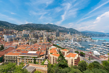Naklejka na ściany i meble Beautiful panoramic view on Monaco at daytime, the great port with luxury yachts in a sunny day