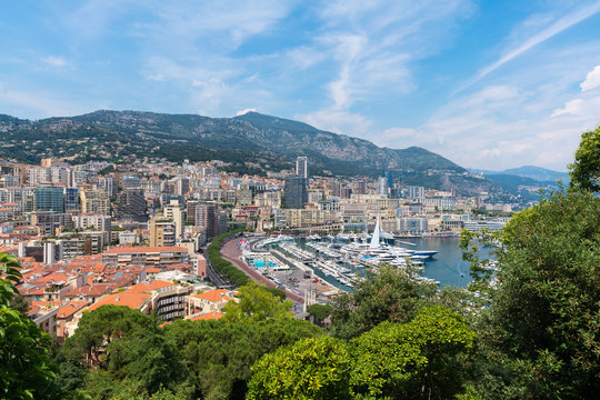 Beautiful panoramic view on Monaco at daytime, the great port with luxury yachts in a sunny day