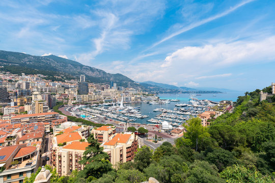 Beautiful panoramic view on Monaco at daytime, the great port with luxury yachts in a sunny day