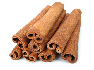 Cinnamon sticks isolated on white background closeup