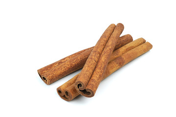 Cinnamon sticks isolated on white background closeup