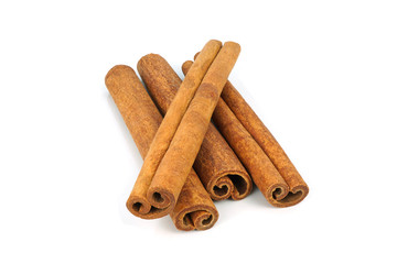 Cinnamon sticks isolated on white background closeup
