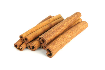 Cinnamon sticks isolated on white background closeup