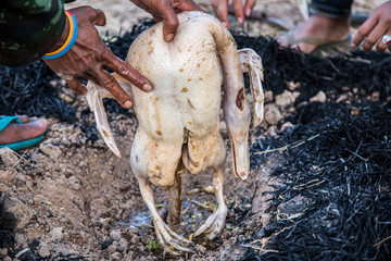 grill chicken on soil with dry straw is culture menu