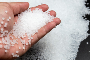 Fototapeta premium Close-up of plastic polymer granules. polymer plastic. compound polymer..plastic beads