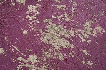 Background of cracked red color on cement wall