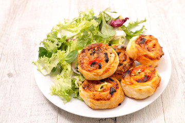 puff pastry roll with olive and tomato sauce-appetizer, finger food, snack