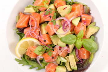 salad with salmon, avocado, onion and basil