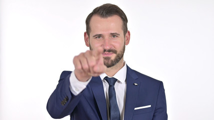 Portrait of Young Businessman Pointing Finger and Inviting, White Background