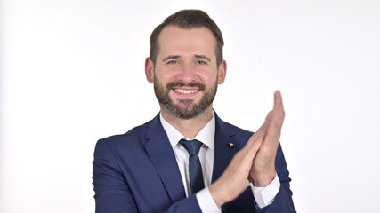 Portrait of Cheerful Young Businessman Clapping, White Background