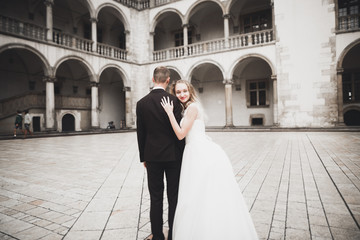 Caucasian happy romantic young couple celebrating their marriage. Outdoor