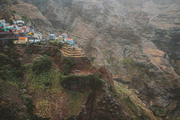 Epic Fontaihas village. Settlement in the rocky coast of Santo Antao island. Houses nestle into the...
