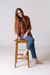 Young caucasian woman posing in studio