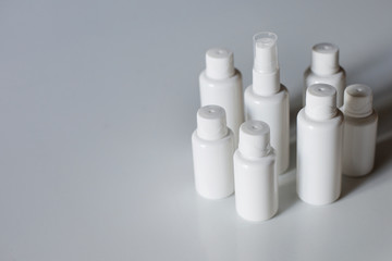 White plastic medicine jars