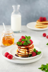Sweet pancakes with raspberry