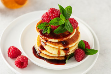Sweet pancakes with raspberry