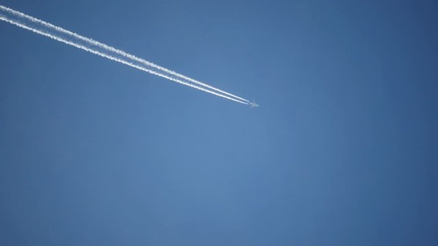 Passenger aircraft airliners in the sky at high altitude 30 thousand feet 