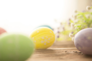 Easter eggs on a old wooden surface