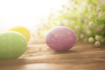 Easter eggs on a old wooden surface