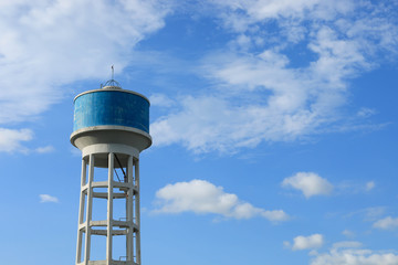 Water Storage tank on blue sky background.