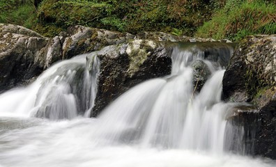 Closeup of a small waterfall on the East Lynn river Devon