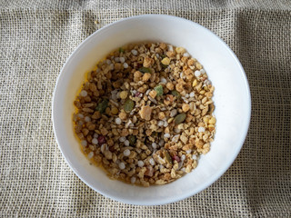 Healthy cereals, muesli on the table in a plate.